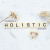 Wellbeing: a holistic approach text on a marble background surrounded by flowers